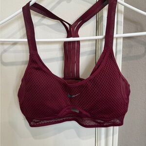 Nike sports bras. 3 different color ways size S $55/ea. Selling all 3 as a set.
